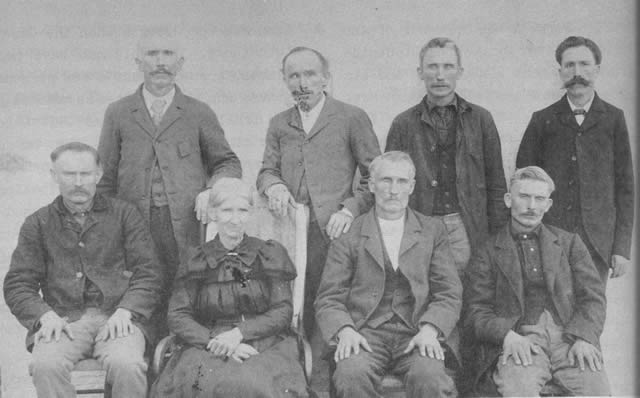 Mrs. Missouri Casey and her sons: (seated) Jeff, Mrs. Casey, Cal, and Price; (standing) Ben, Button, Lonnie, and Dock.