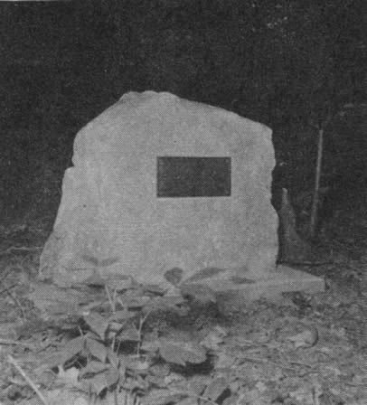 Inscription on the bronze plaque reads: 'Here lies an Unknown Confederate Soldier slain with an axe during the Civil War by Lydia Coleman Short in defense of her husband John Short. Erected in 1962 by Short Descendants: Dewey Short - Fred Steele - Ethel Steele - Mary Scott Hair.'