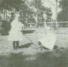  The Cooper sisters playing on lawn in 1896.  In the background is the home of Thomas Josiah Keet.
