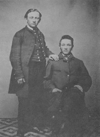 J. G. Burger II, age 18, with Henry Millhouse (seated). Tintype was made at Paducah, Ky., May 1862.
