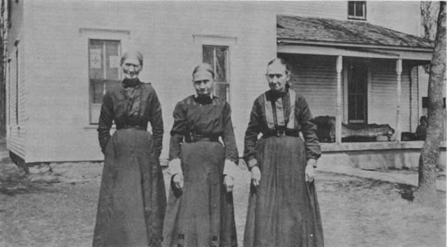 Three Wooley sisters: Ailcy Wooley Carr, born May 16, 1842, on her mother's birthday; Sarah Frances Wooley Carter, born December 12, 1840, on her father's birthday; Christenny Wooley Yocum, born January 25, 1847, on their sister Elizabeth's birthday.  Picture taken in front of Grandma Sarah Carter's house by her son, Joseph Leonard Carter, about 1902.