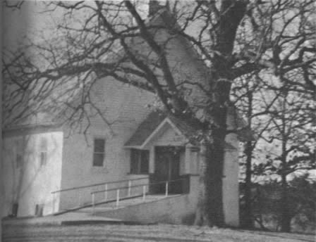 Front of new Taneyville Chapel showing ramp up to front.