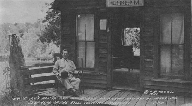 'Uncle Ike's son in the old rocker with cane and hat at Notch, Mo. Shepherd of the Hills Country, Missouri'
