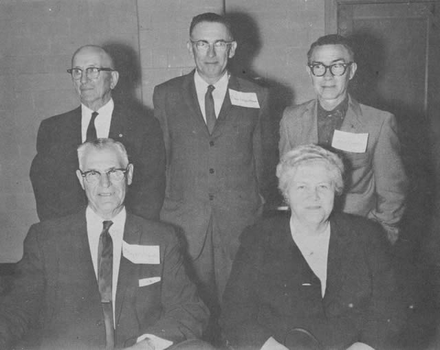 Officers and Directors at Fall Meeting: President Ralph D. McPherson and Vice-president Frances McConkey; (standing) Claude Hibbard, Director for Douglas County, Secretary Elmo Ingenthron, and Leon Farrell, Director for Taney County.